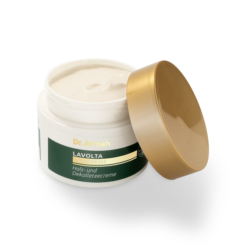 Geöffneter Tiegel der Dr. Armah Lavolta Parakresse Hals- und Dekolleteecreme mit goldenem Deckel, der daneben lehnt.
