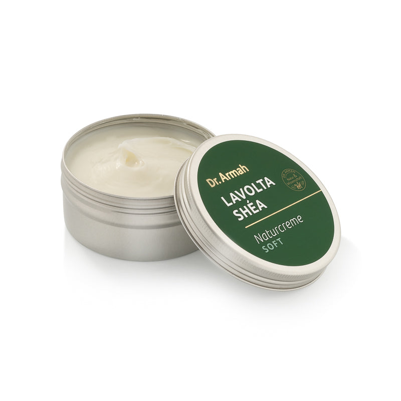 Geöffneter Tiegel der Dr. Armah Lavolta Shéa Naturcreme Soft, der die Cremetextur zeigt (Open jar of Dr. Armah Lavolta Shéa Naturcreme Soft showing the cream texture).