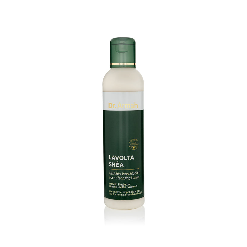 Eine Flasche der Shea Ginseng Gesichts-Waschlotion, eine belebende Reinigungslotion mit Sheaöl für eine sanfte und erfrischende Gesichtsreinigung.