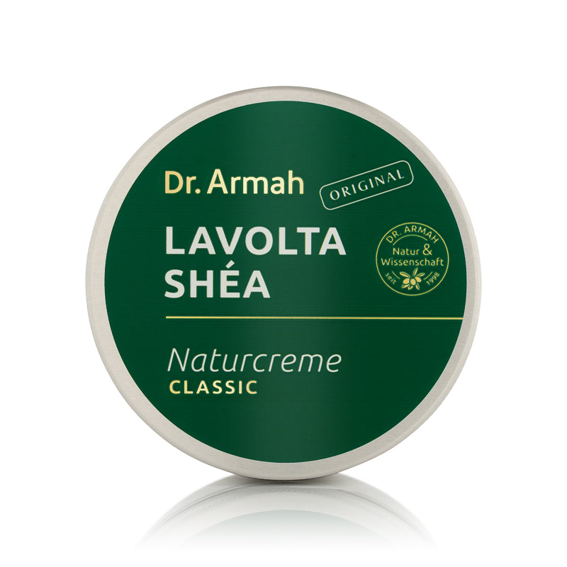 Nahaufnahme des dunkelgrünen Deckels der Dr. Armah Lavolta Shéa Naturcreme Classic.